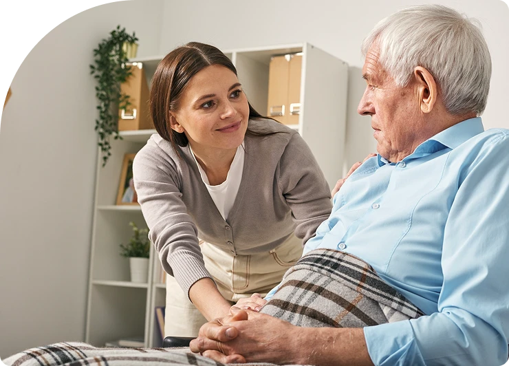 A young woman takes care of an elderly man