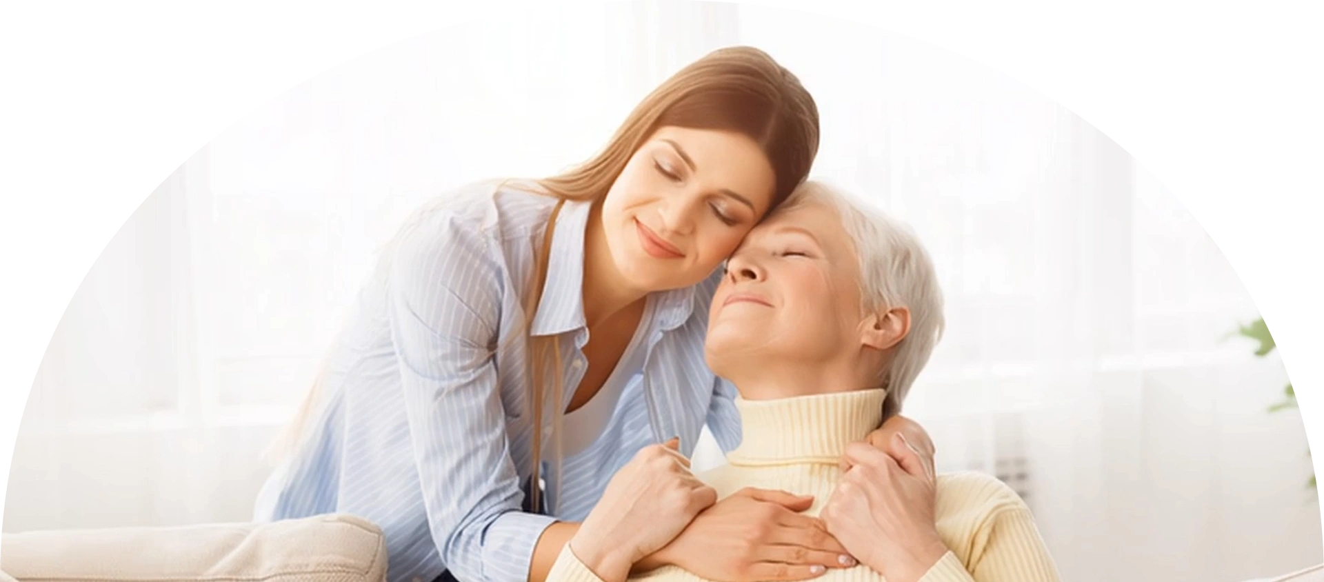 Mother and daughter embracing in a warm hug